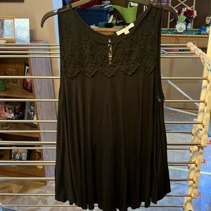 Black loose fitting sleeveless shirt